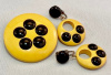 BP280 cream/blk bakelite M&M pin/ers